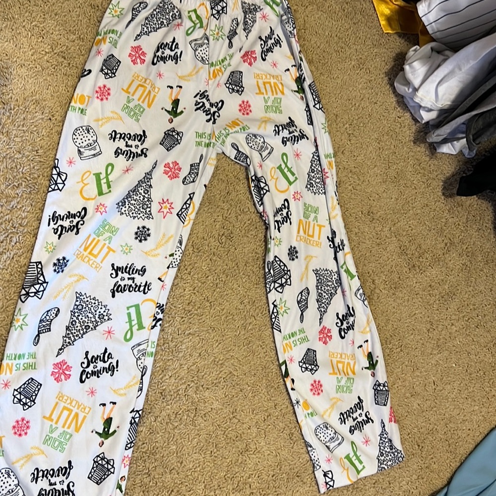 Youth large 2 piece ELF pajamas. Comes with tips and bottoms